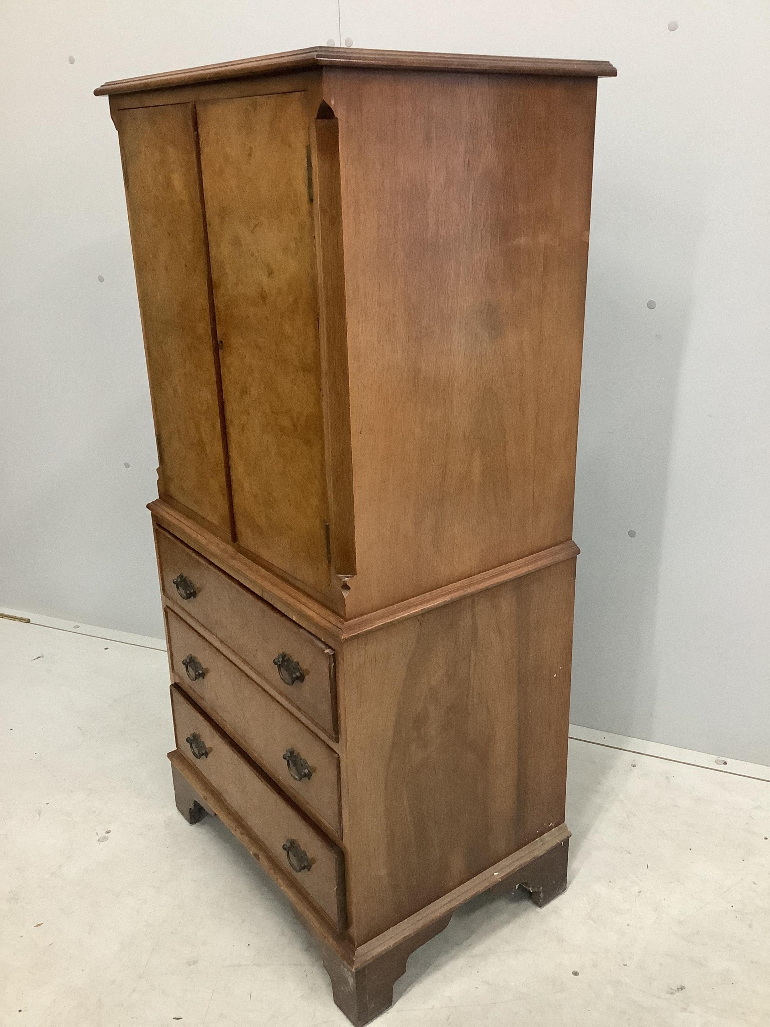 A Queen Anne Revival walnut cocktail cabinet, width 58cm, depth 43cm, height 126cm. Condition - fair to good